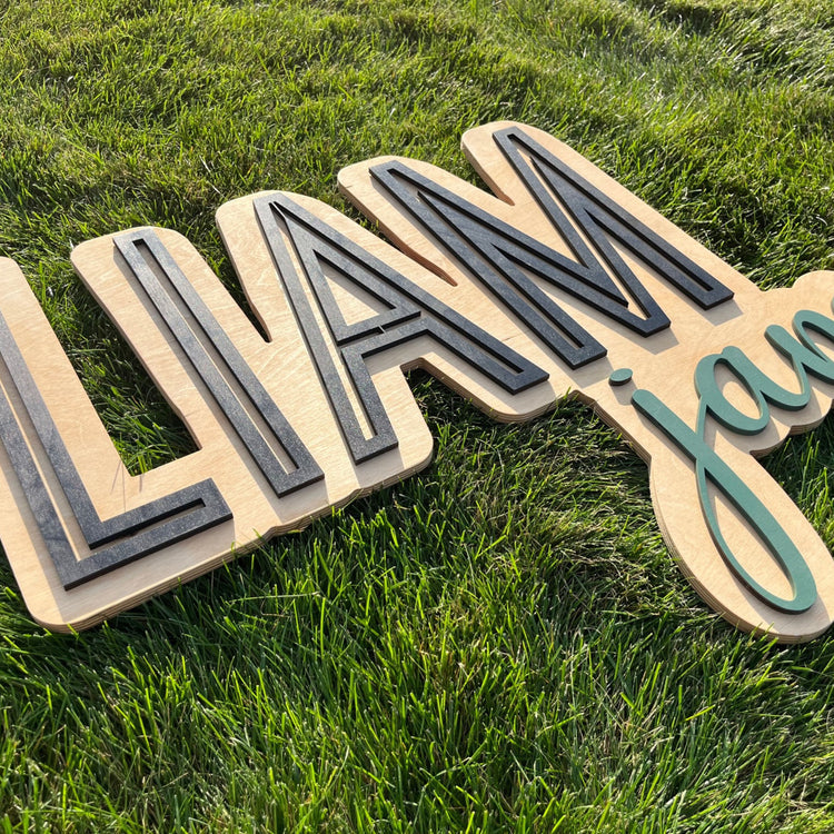 The Liam James Layered Sign